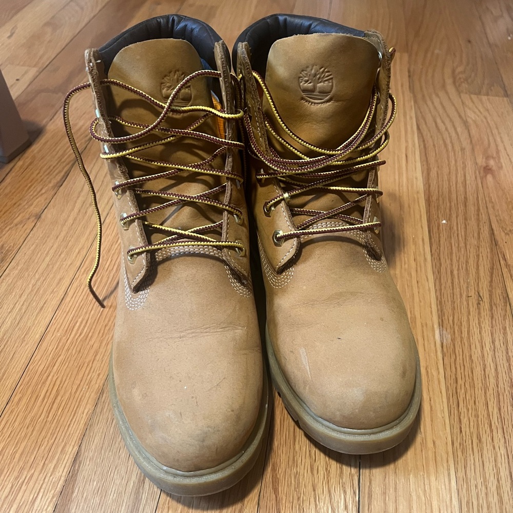 Timberland Tan Lace Up Boots with Rugged High Top Design